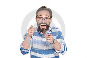 Delighted intelligent bearded man pointing at you with two forefingers photo