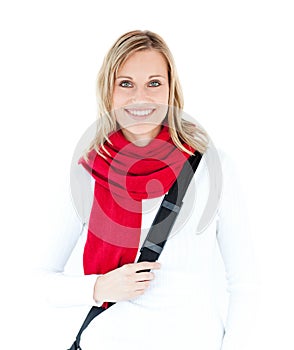 Delighted student with scarf smiling at the camera