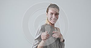 Delighted woman showing her satisfaction