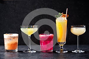 Delightful variously colored refreshment cocktail drinks