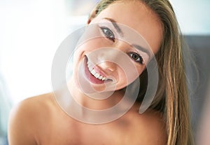 Delightfully desirable. Cropped portrait of a beautiful young woman at home. photo