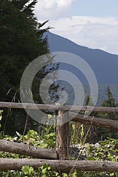 Delimitation wood fence at the edge of a cliff