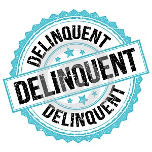 DELINQUENT text on blue-black round stamp sign