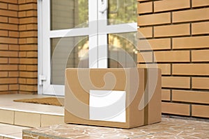 Delivered parcel on porch near door