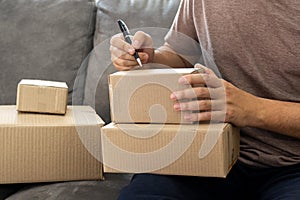 Delivery business Small and Medium EnterpriseSMEs Workers packaging box In Distribution Warehouse home office for shipping to