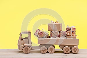 Delivery of gifts and souvenirs for various holidays and events. Toy truck.