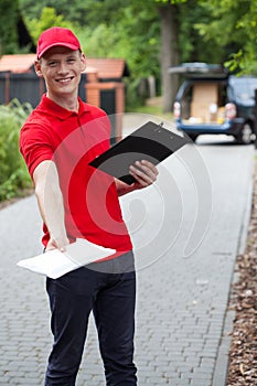 Delivery guy giving a packet