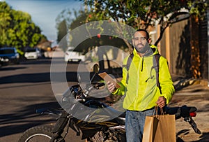 Delivery guy portrait with orders