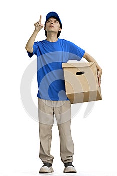 The delivery guy, on a white background, full-length, with a box, pointing up