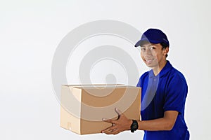 Delivery Man in Blue Uniform Send Package in Cardboard Box