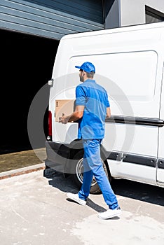 Delivery man with box