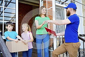 Delivery man delivering boxes