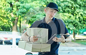 Delivery Man Delivering Package Box To Homeowner