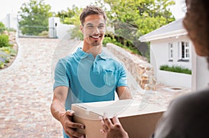 Delivery man delivering parcel