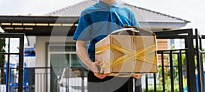 Delivery man he emotional courier hold damaged cardboard box is broken