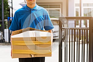 Delivery man he emotional courier hold damaged cardboard box is broken