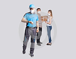 Delivery man employee in blue uniform and face mask delivered the package and he is in a hurry to deliver another goods.