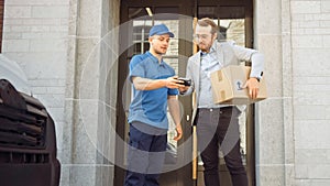 Delivery Man Gives Postal Package to a Business Customer, Who Signs Electronic Signature POD Devic