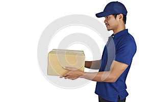 Delivery man holding box on white background