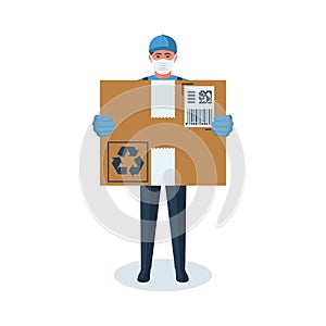 Delivery man holding cardboard boxes in medical rubber gloves and mask