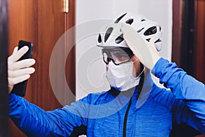 Delivery man holding cardboard boxes in medical rubber gloves and mask. copy space. Fast and free Delivery transport