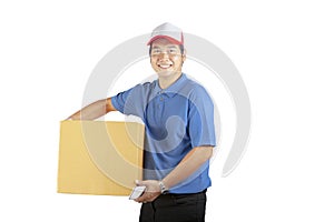 Delivery man holding cardbox toothy smiling face with profession