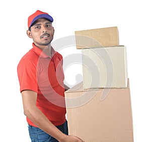 Delivery man holding carton boxes in uniform
