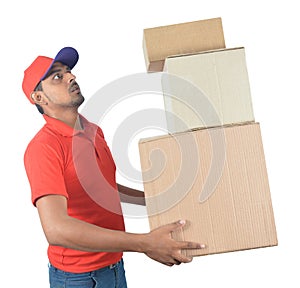 Delivery man holding carton boxes in uniform