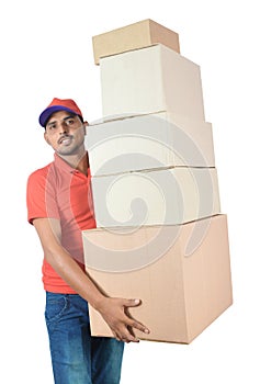 Delivery man holding carton boxes in uniform