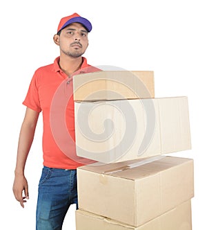 Delivery man holding carton boxes in uniform