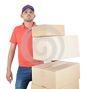 Delivery man holding carton boxes in uniform