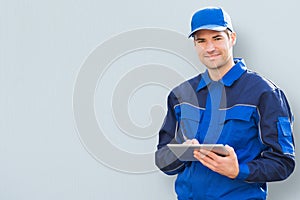 Delivery Man Holding Clipboard