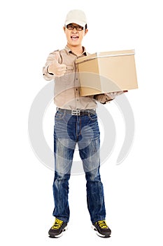 Delivery man holding goods and thumb up