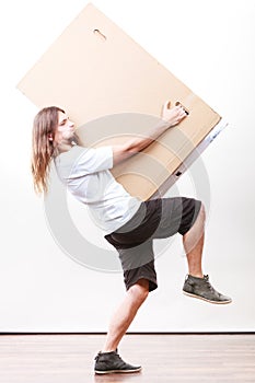 Delivery man holding a paper box.