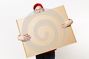 Delivery man in red uniform isolated on white background. Male in cap, t-shirt, jeans working as courier or dealer