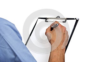 Delivery man's hand signing document on clipboard