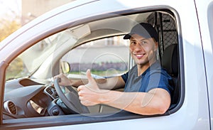 Delivery man sitting in a delivery van