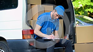 Delivery man stocktaking checklist with amount of parcels, part-time job service