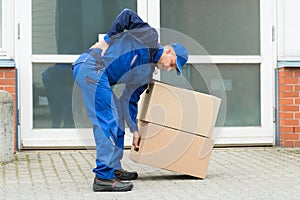 Delivery Man Suffering From Backpain photo