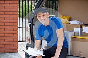 Delivery man taking break from work