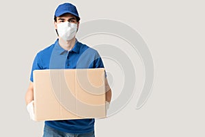 Delivery Man Wearing Mask While Carrying Parcel