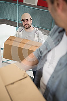 delivery postmen with box