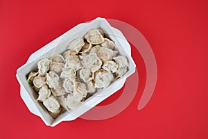 Delivery of ready-made food. A box of dumplings from a restaurant photo