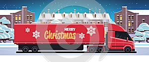 Delivery semi truck driving city street shipping transport for merry christmas happy new year winter holidays