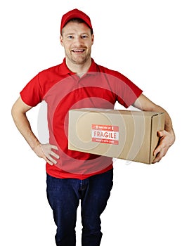 Delivery service courier in red uniform with fragile shipment box isolated on white