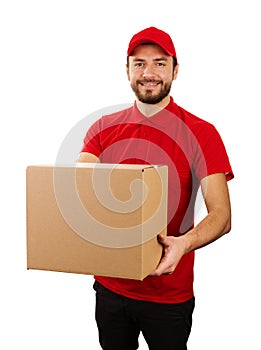 Delivery service - young smiling courier holding cardboard box