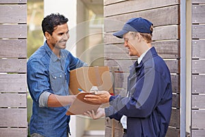 Delivery, sign and man in home with courier for shipping, logistics and online shopping with box. Ecommerce, paperwork