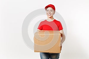 Delivery smiling woman in red uniform isolated on white background. Female in cap, t-shirt, jeans working as courier or