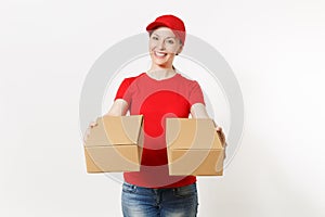 Delivery smiling woman in red uniform isolated on white background. Female in cap, t-shirt, jeans working as courier or