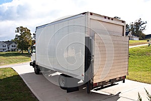 Delivery Truck/Driveway/Home